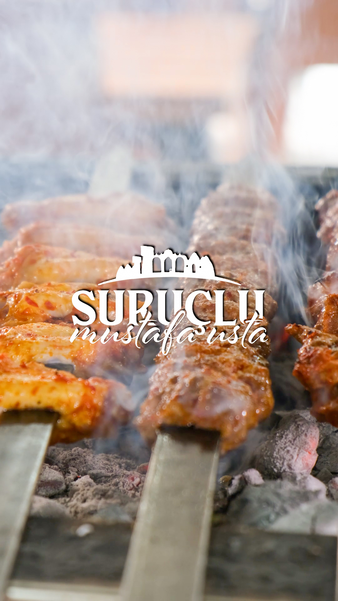 Kebabs grilling over embers